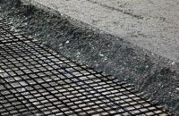 Как выполняется укладка геосетки в асфальтобетонное дорожное покрытие?